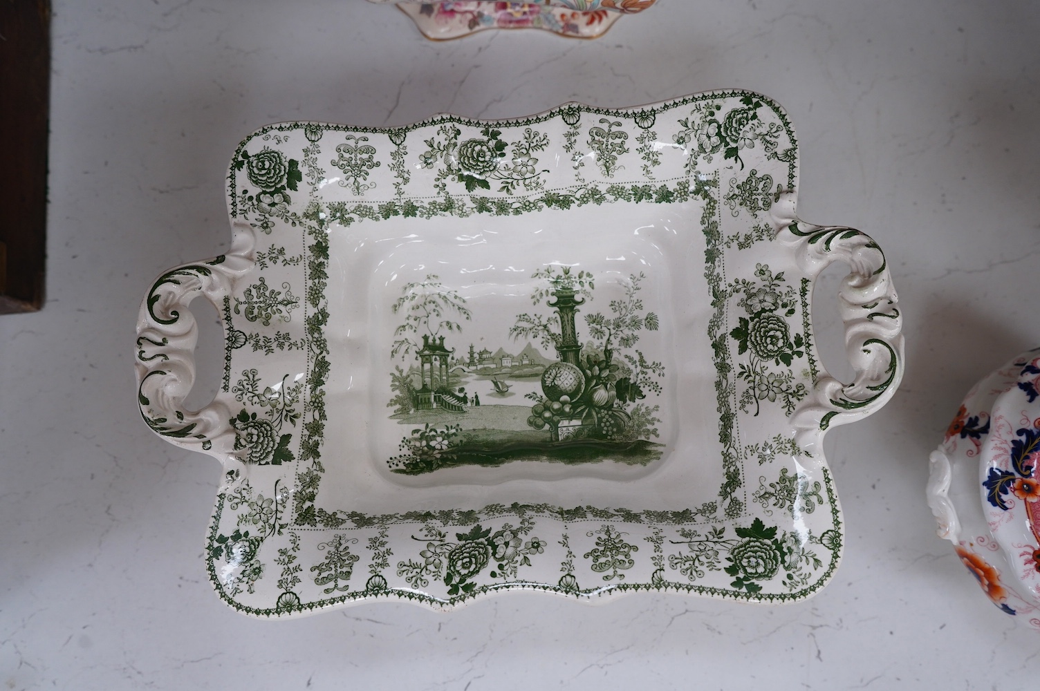 A Mason's ironstone tureen and cover, early 20th century, a Victorian Peking comport and a floral bowl and cover, largest 33cm (3). Condition - good